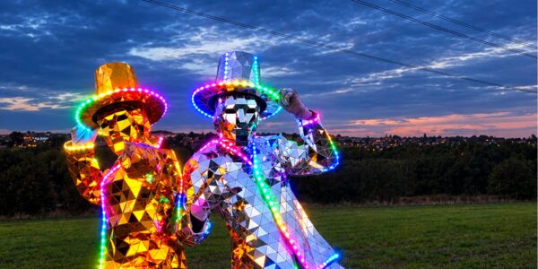 Gold-And-Silver-LED-Mirror-Men-At-Dusk