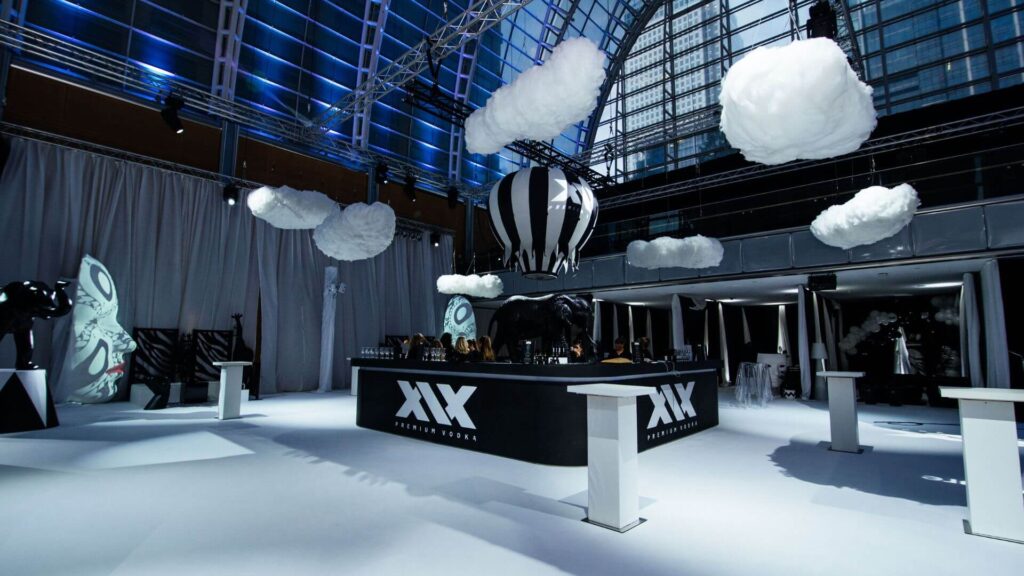 Event space with a stage, seating and clear routes between production areas