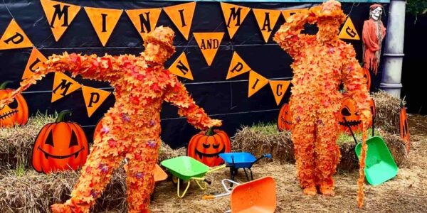 Autumn-Leaf-Men-With-Pumpkins-And-Hay-Bales