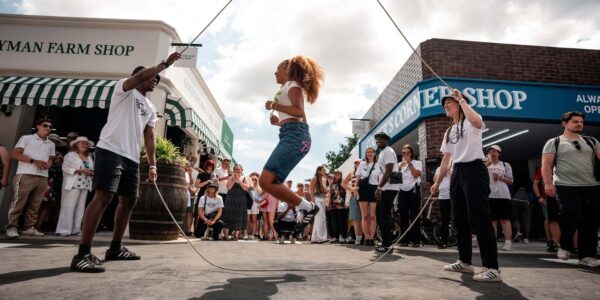 Female-Double-Dutch-Performer-Jumping-Crowd