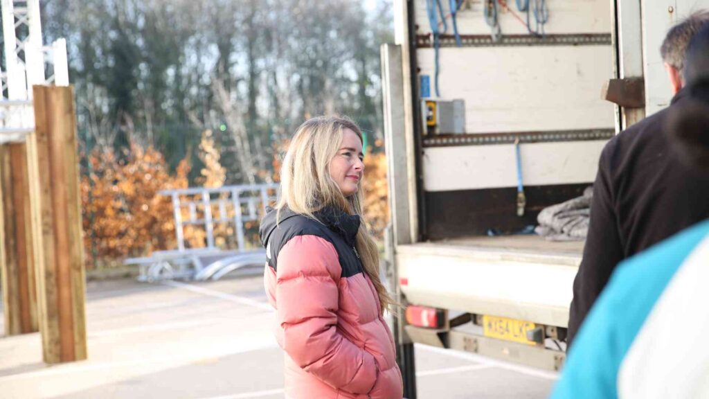 Julia Charles overseeing suppliers and event deliveries on site at the Gymshark Christmas event