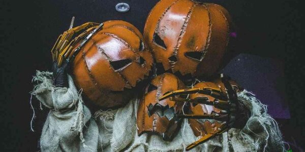 Spooky-Pumpkin-Stilt-Walker-At-Night